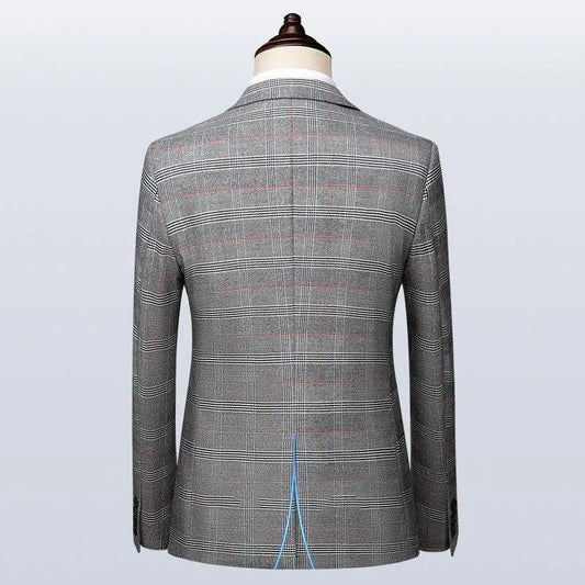 Back view of a gray plaid men's suit jacket on mannequin, classic tailored design