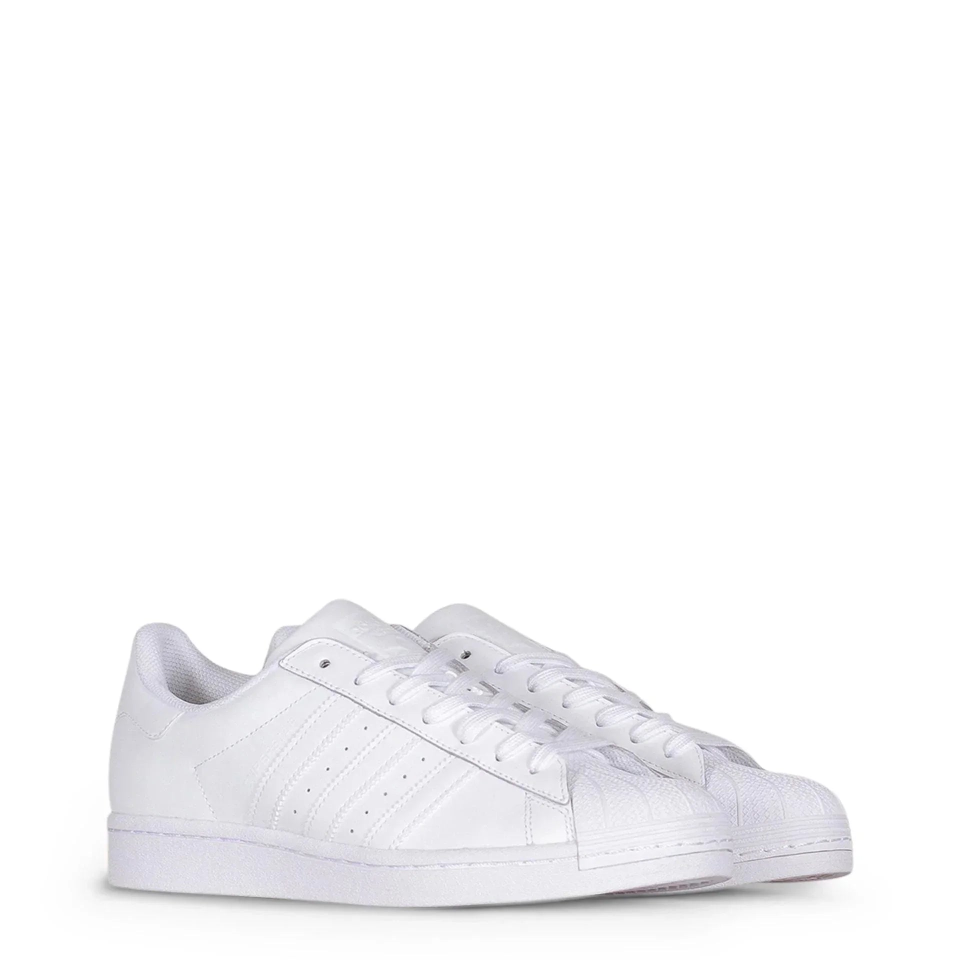Pair of all-white Adidas low-top sneakers on white background, luxury footwear at GUOCALI