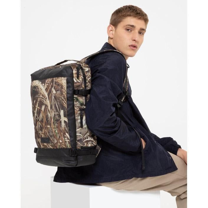 Man modeling GUOCALI camo print backpack, stylish urban fashion, white background