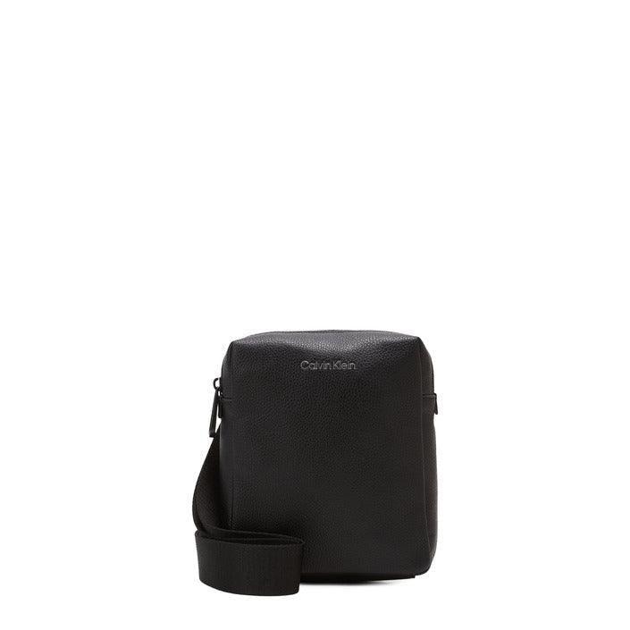 Calvin Klein black leather crossbody bag with logo, minimalist design on white background