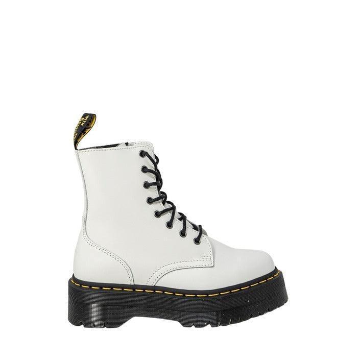 White Dr. Martens boot with black laces and chunky sole on white background