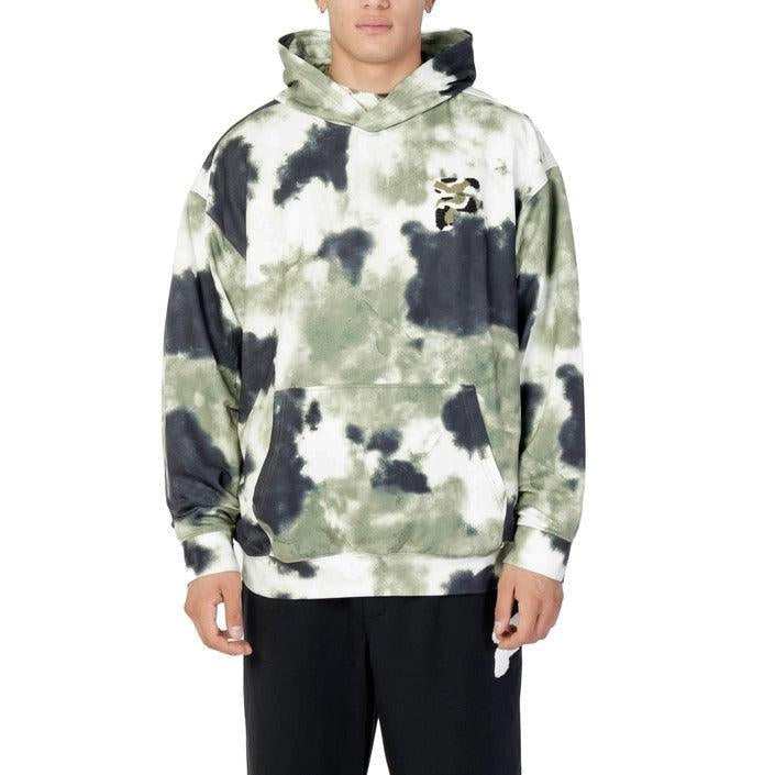 Man wearing green and black tie-dye hoodie with kangaroo pocket, casual streetwear style