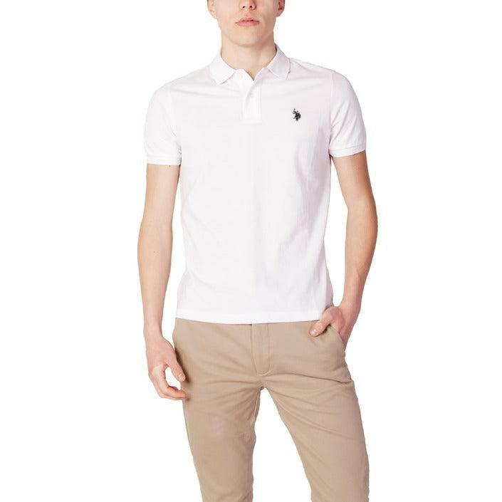Man wearing white polo shirt and beige pants on white background
