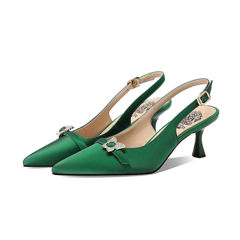 Green satin women's slingback heels with jeweled buckle and pointed toe