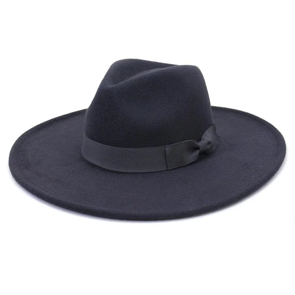 Black wide brim retro fedora hat with ribbon band on white background