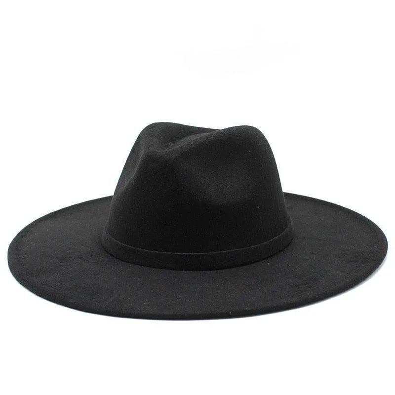 Black British style fedora hat with wide brim on white background