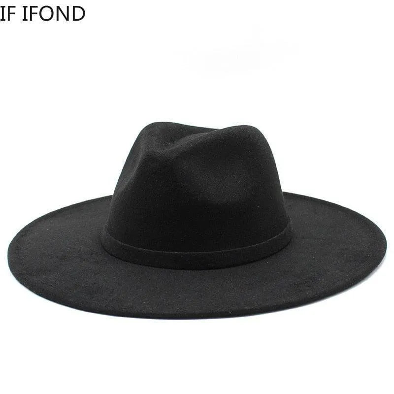 Classic black British style fedora hat with wide brim on white background