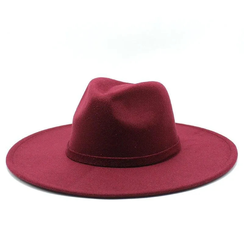 Maroon British style fedora hat with wide brim on white background