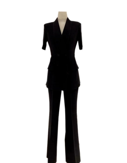 Black double-breasted women's business pantsuit on mannequin, trouser suit set