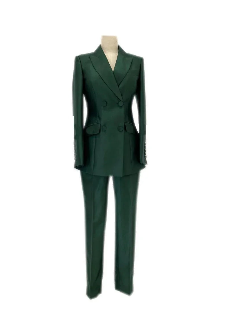 Green double-breasted women's business pantsuit on mannequin, trouser suit set