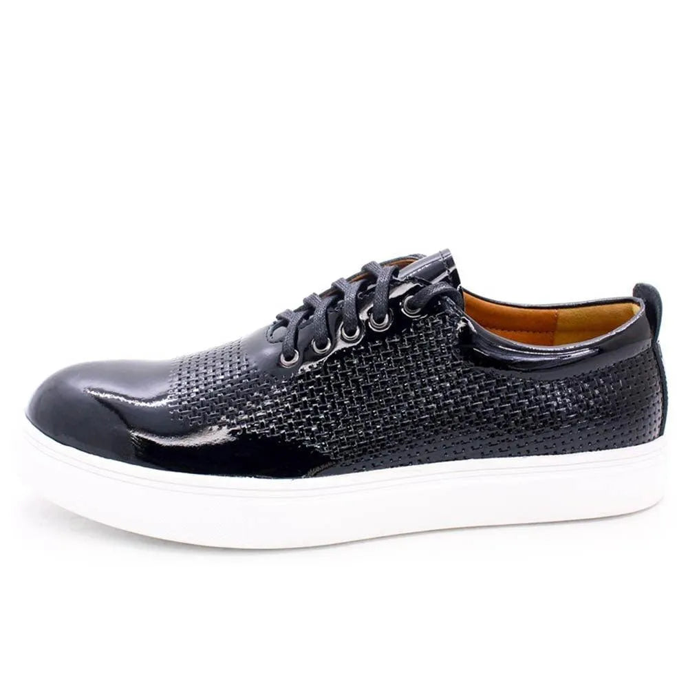 Black glossy leather dress sneaker with woven texture and white sole on white background