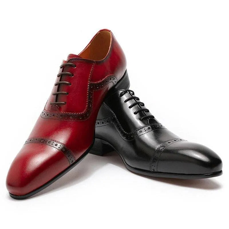 Elegant men's pointed toe dress shoes in red and black leather with brogue details