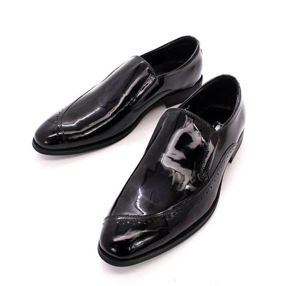 Glossy black slip-on dress shoes for men on a white background