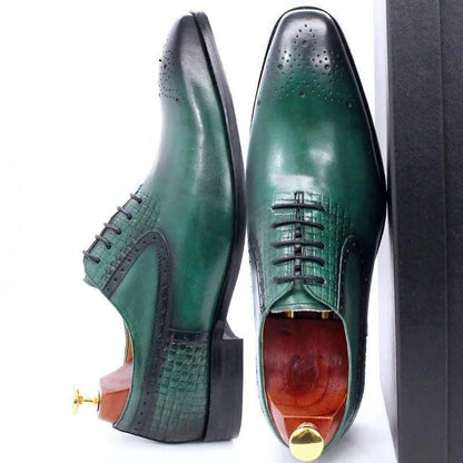 Green leather lace-up men's dress shoes with black toe detailing on white background