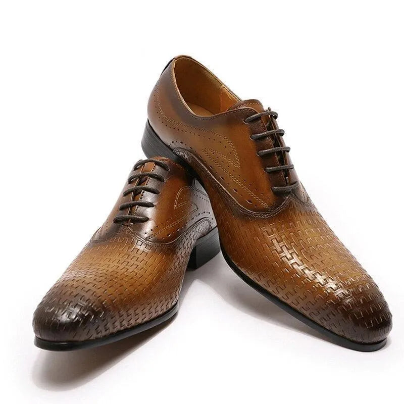Brown woven leather pointed toe dress shoes with lace-up design on white background