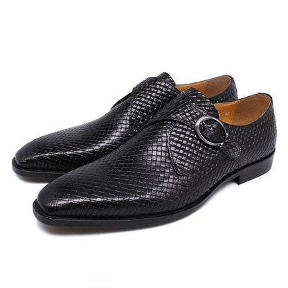 Black woven leather men's dress shoes with buckle, formal footwear on white background