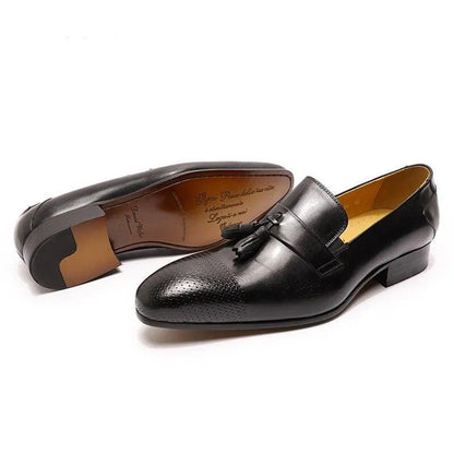 Black leather tassel loafer dress shoes for men with perforated toe detail