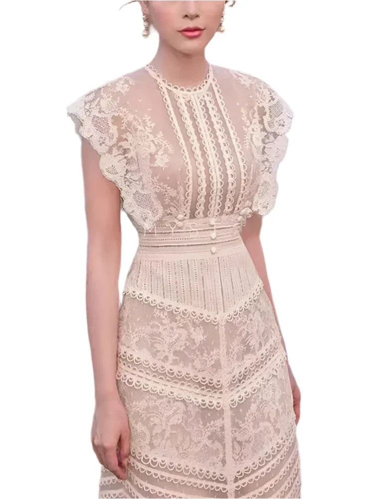 Cream lace dress with ruffled cap sleeves and tiered lace panels fashion image