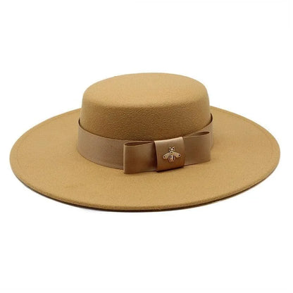 Camel flat top fedora hat for women with French bowknot and gold bee brooch accent