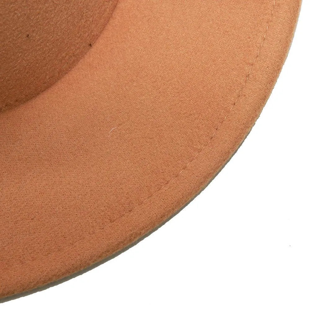 Close-up of tan felt fedora hat brim, stylish accessory, classic fashion detail
