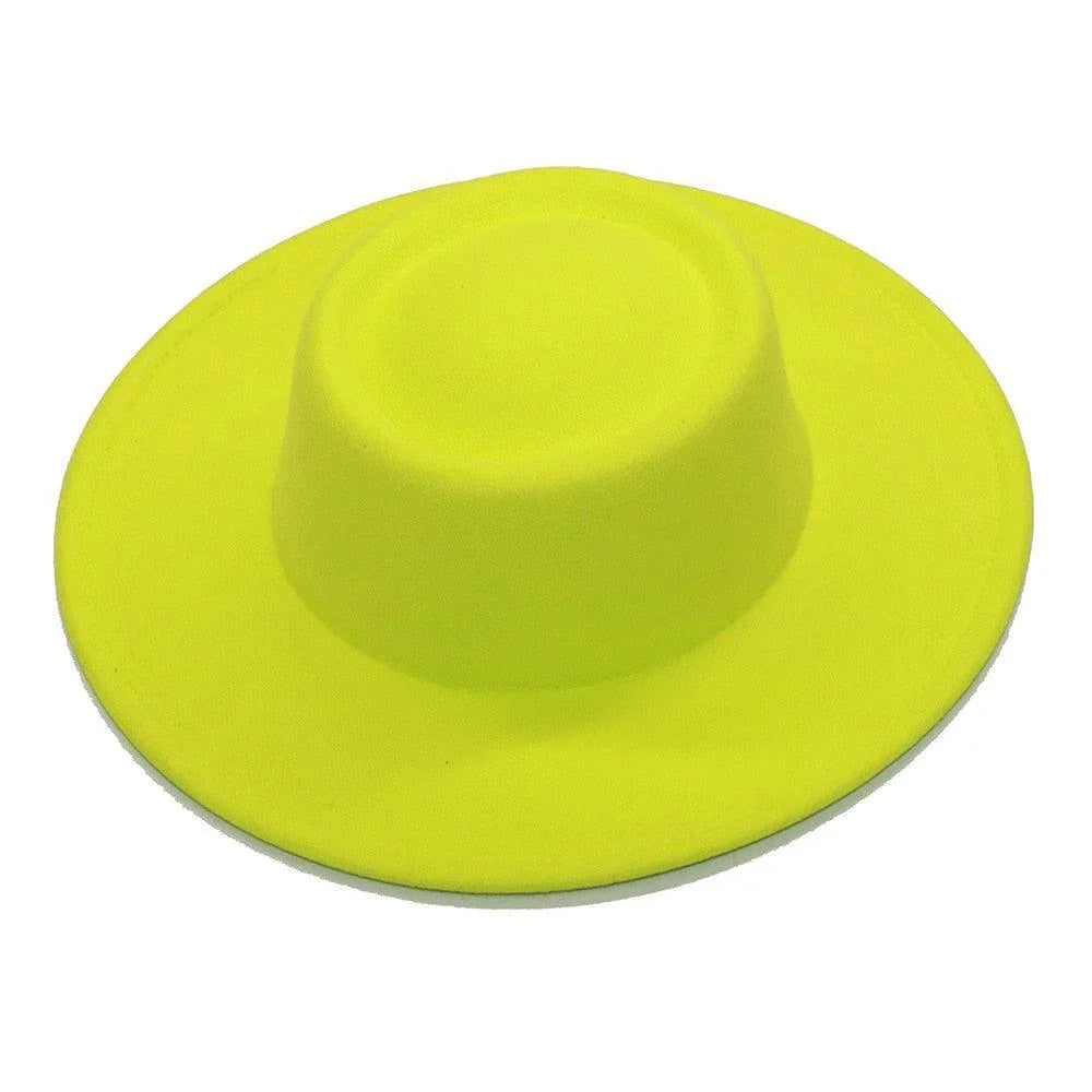 Bright yellow wide brim fedora hat on white background