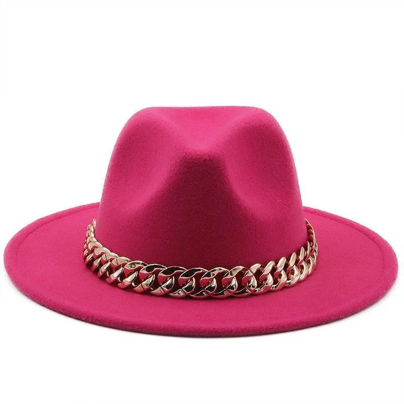 Pink luxury fedora hat with gold chunky chain detail on white background