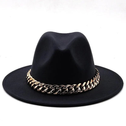 Black luxury fedora hat with wide brim and chunky gold chain band on white background