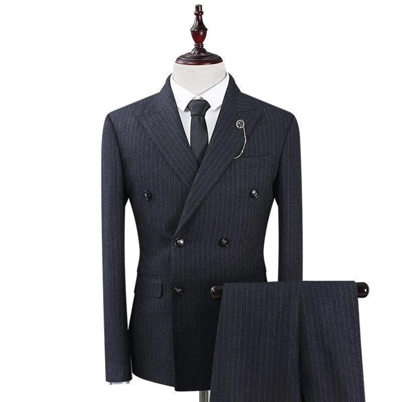 Men's dark striped three-piece suit with double-breasted jacket and tie on mannequin