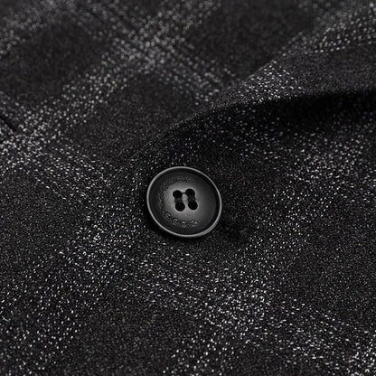 Close-up of black plaid suit fabric with a decorative black button