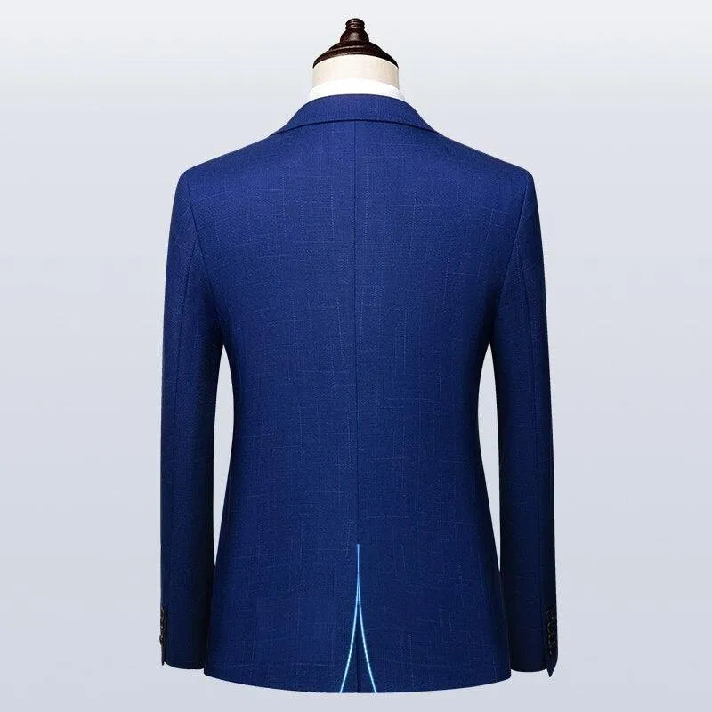 Back view of blue men's suit jacket on mannequin, classic modern design
