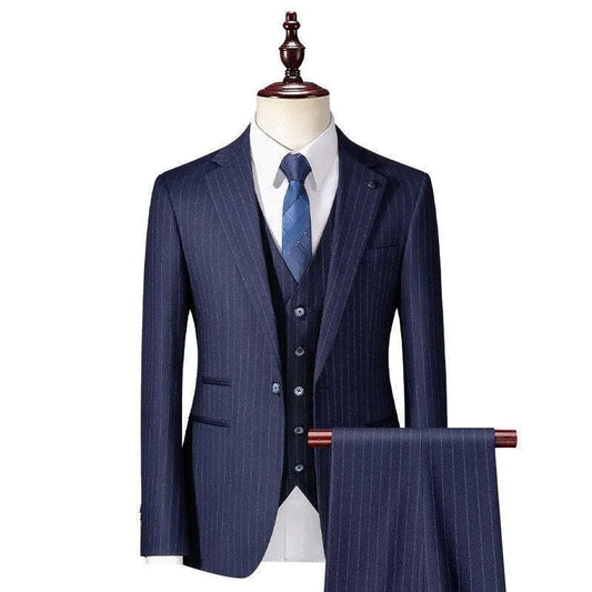 Navy blue striped men's 3-piece suit with tie displayed on mannequin