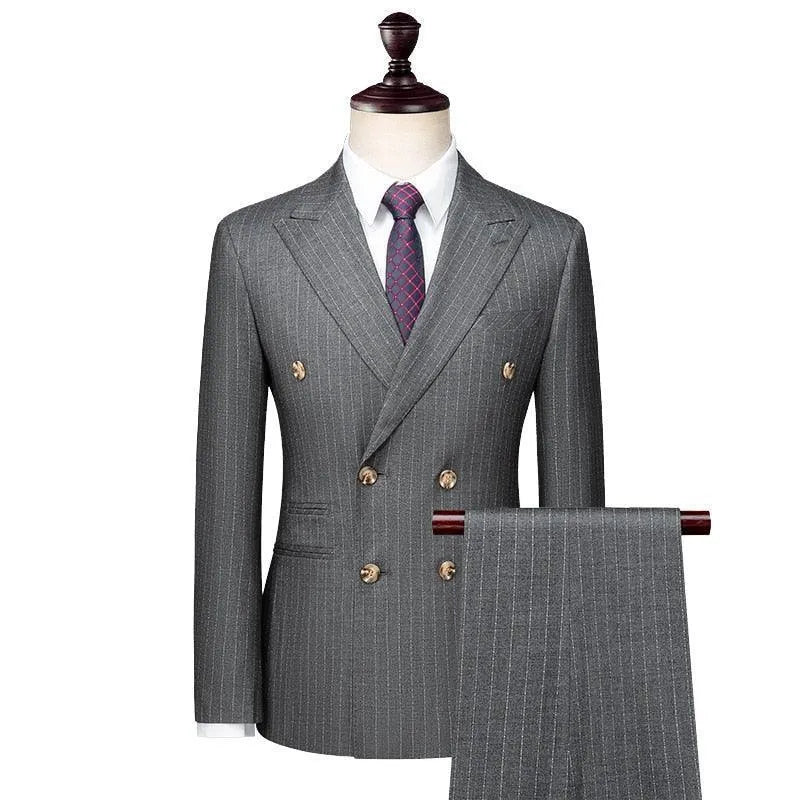 Gray pinstripe double-breasted suit with gold buttons on mannequin, matching trousers displayed