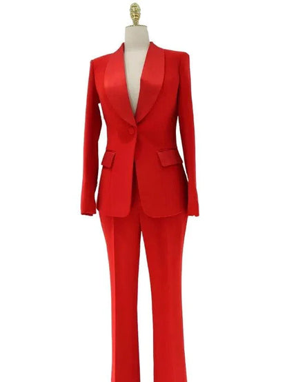 Red satin lapel collar women's pant suit on mannequin, tailored blazer and trousers