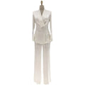 White satin wide-leg double-breasted women's pantsuit on a mannequin