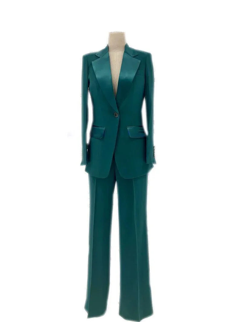Teal silk satin women's wedding pantsuit with blazer and wide-leg trousers on mannequin