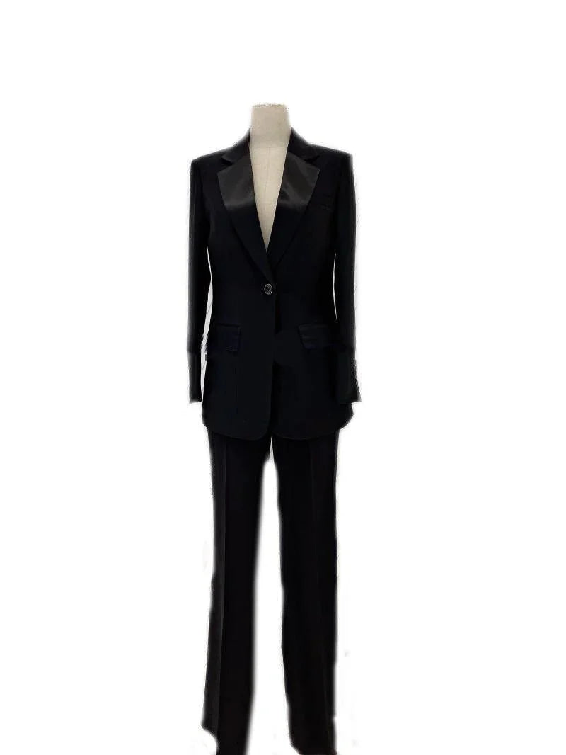Black satin wedding pantsuit for women with blazer and trousers on mannequin