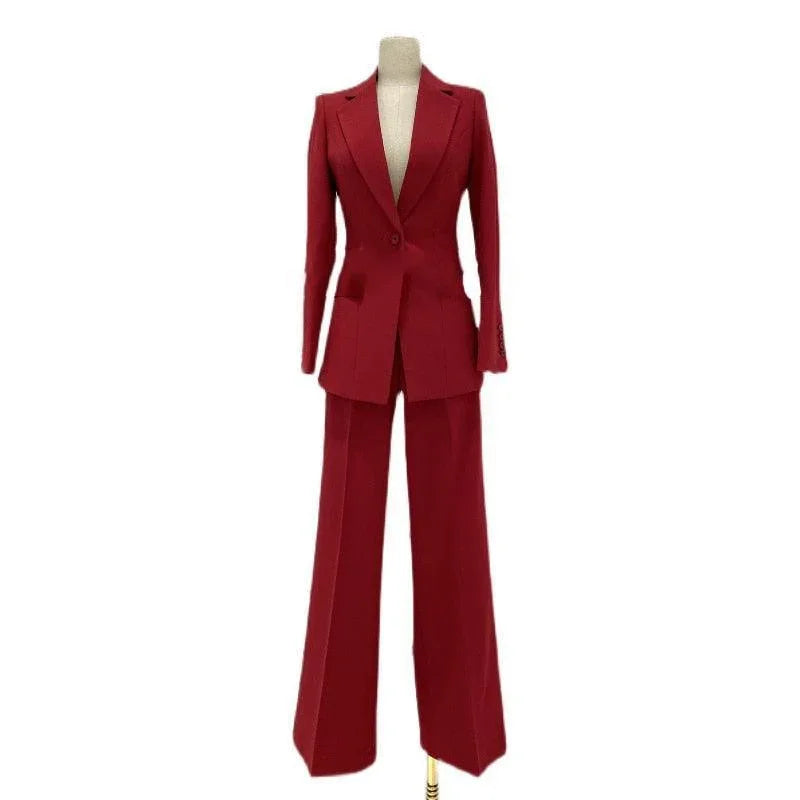 Red wide leg women's business pantsuit displayed on mannequin