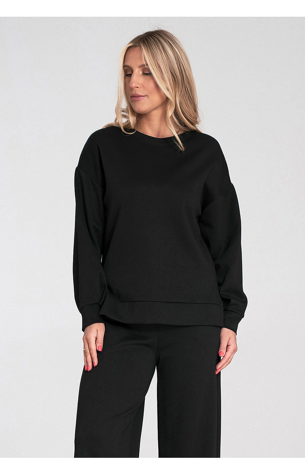 Women's sweatshirt black high-low hem with side slits front view
